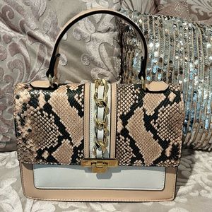 Pink snake skin Aldo purse